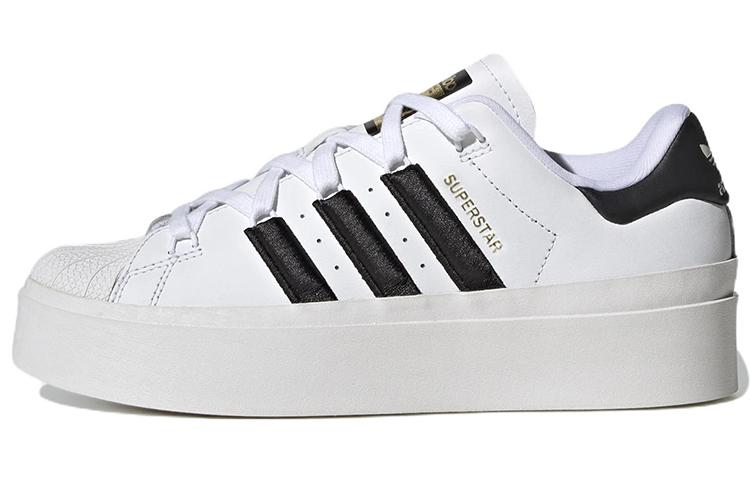 https://d2cva83hdk3bwc.cloudfront.net/GX1840-superstar-women-s-adidas-originals-bonega-white-black-gold-metallic-women-s-1.jpg