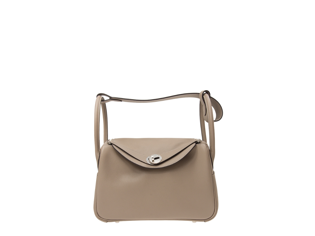 https://d2cva83hdk3bwc.cloudfront.net/HRM-SBBHL2ILWPHTKMD-hermes-lindy-26-in-leather-with-palladium-hardware-1.jpg