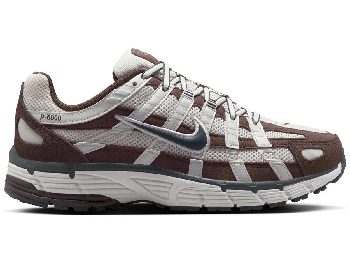 https://d2cva83hdk3bwc.cloudfront.net/HV8972-001-nike-p-6000-phantom-baroque-brown-metallic-summit-white-armory-navy-women-s--1.jpg