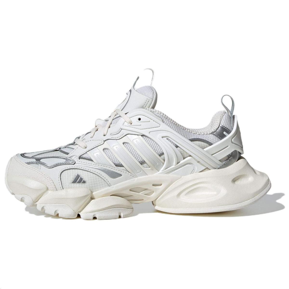 https://d2cva83hdk3bwc.cloudfront.net/IH7795-xlg-runner-deluxe-adidas-white-silver-metallic--1.jpg