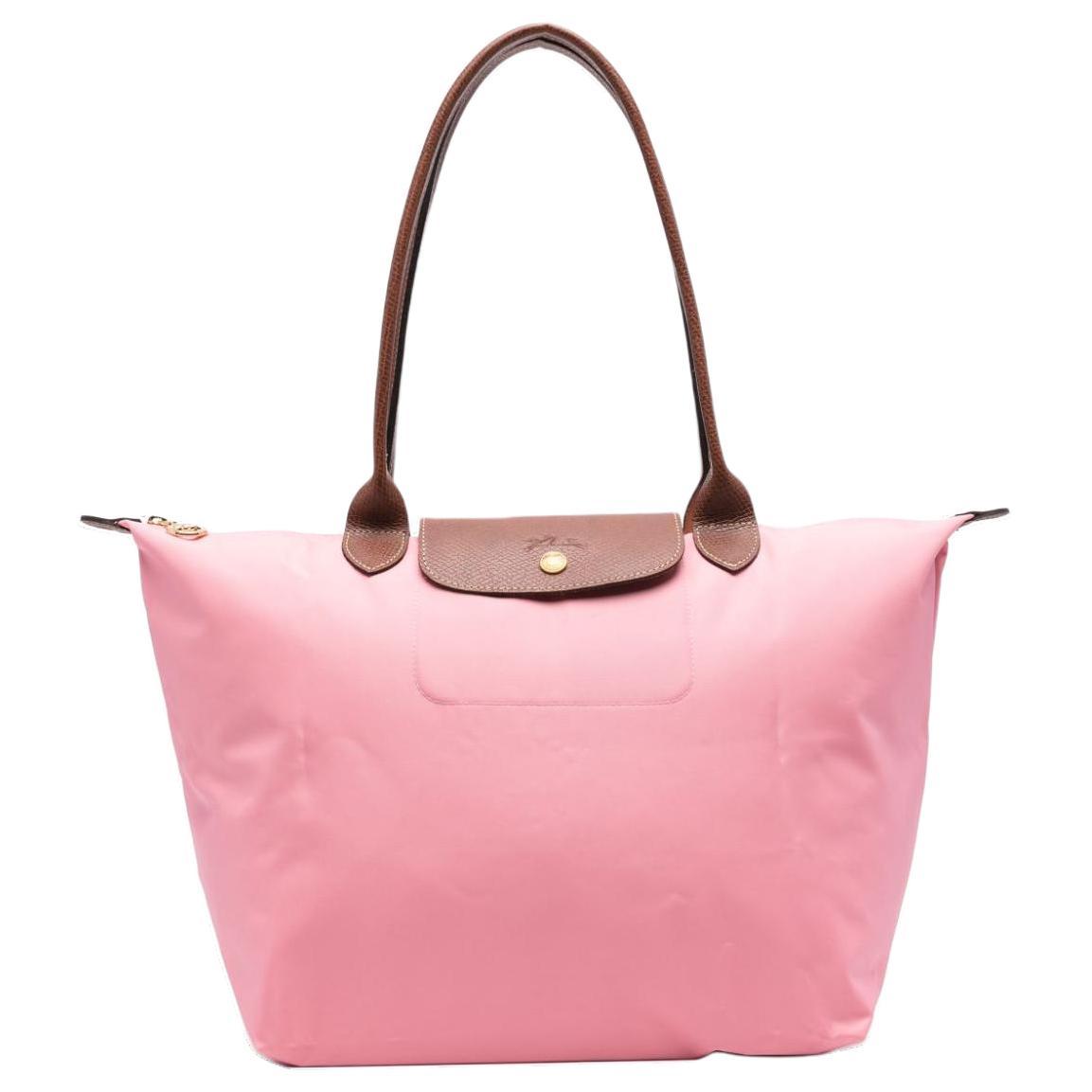 https://d2cva83hdk3bwc.cloudfront.net/L1899089P92-longchamp-le-pliage-large-top-handle-bag-1.jpg
