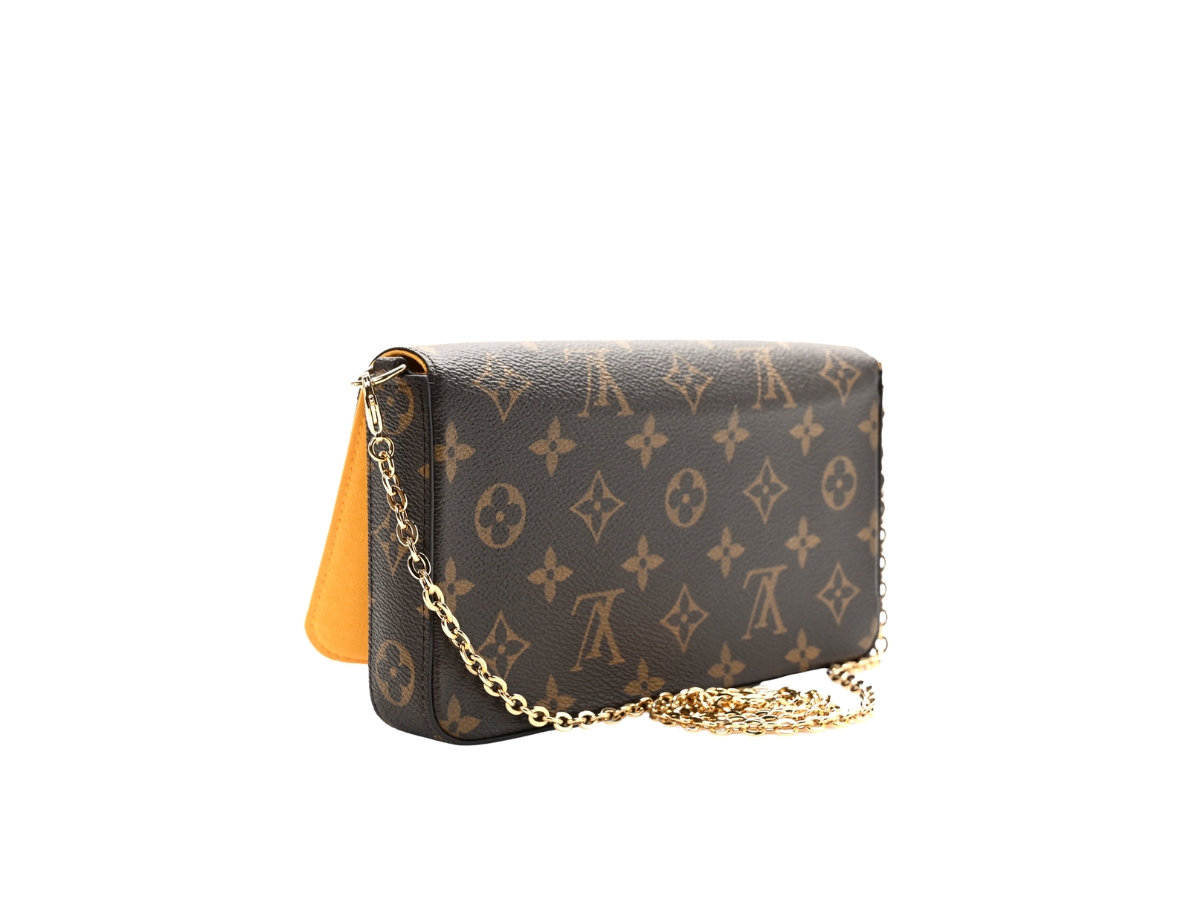 https://d2cva83hdk3bwc.cloudfront.net/LV-TBBLVCAPFCWD0JK-louis-vuitton-christmas-animation-pochette-felicie-chain-wallet-2.jpg