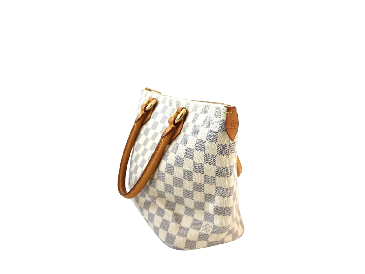 https://d2cva83hdk3bwc.cloudfront.net/LV-TBBLVDASPIWCCALWGHWOZX8-louis-vuitton-damier-azur-saleya-pm-in-white-coated-canvas-and-leather-with-gold-hardware-white-3.jpg
