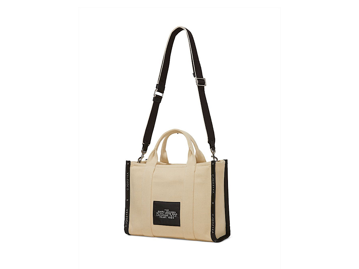 https://d2cva83hdk3bwc.cloudfront.net/M0017027263-marc-jacobs-tote-the-medium-ar-2.jpg