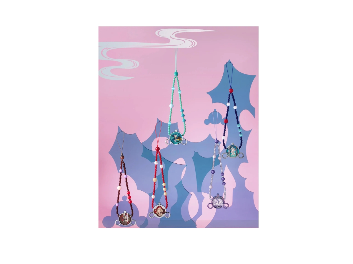 https://d2cva83hdk3bwc.cloudfront.net/PM-BBCPMSTMSPCSBCEJ5-pop-mart-skullpanda-the-mirage-series-phone-chain-single-box-2.jpg