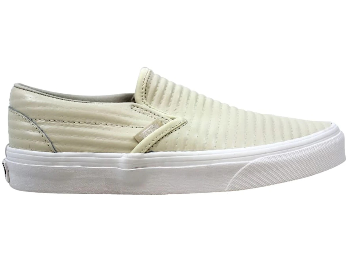 https://d2cva83hdk3bwc.cloudfront.net/VN0A38F7OG8-vans-classic-slip-on-moto-leather-birch-1.jpg