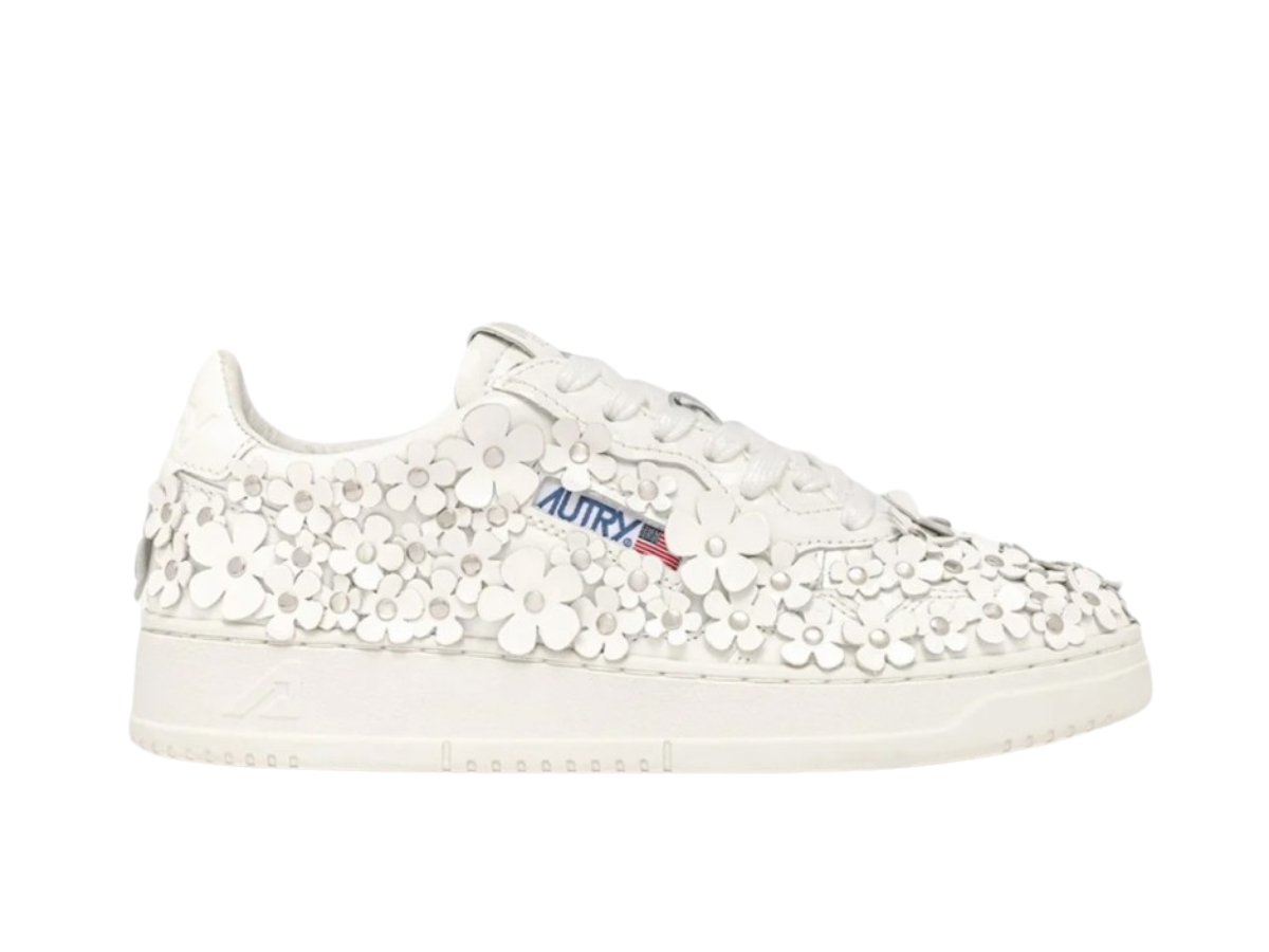 https://d2cva83hdk3bwc.cloudfront.net/a1unaulwpw02-autry-medalist-low-patent-flower-white-women-s-1.jpg