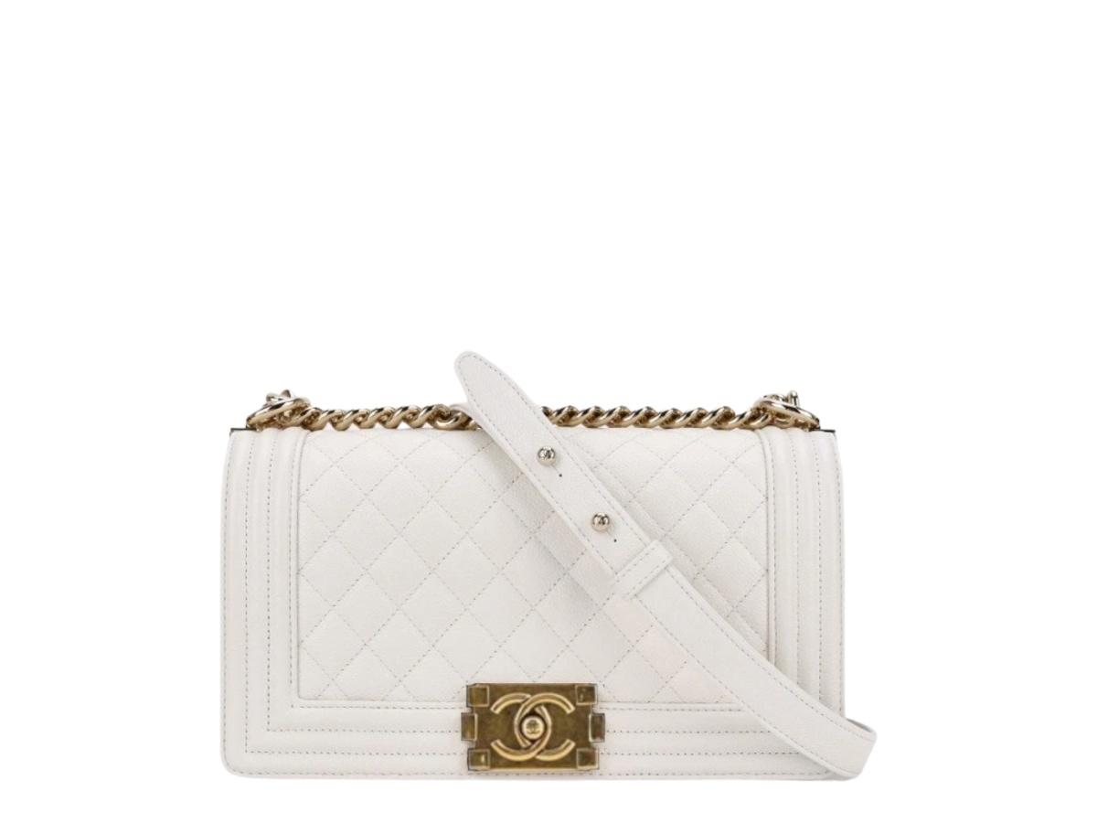 https://d2cva83hdk3bwc.cloudfront.net/a67086-b05839-10601-chanel-boy-chanel-in-cow-leather-with-gold-tone-metal-hardware-white-gold-1.jpg