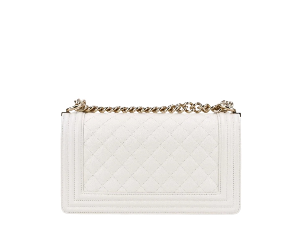https://d2cva83hdk3bwc.cloudfront.net/a67086-b05839-10601-chanel-boy-chanel-in-cow-leather-with-gold-tone-metal-hardware-white-gold-2.jpg