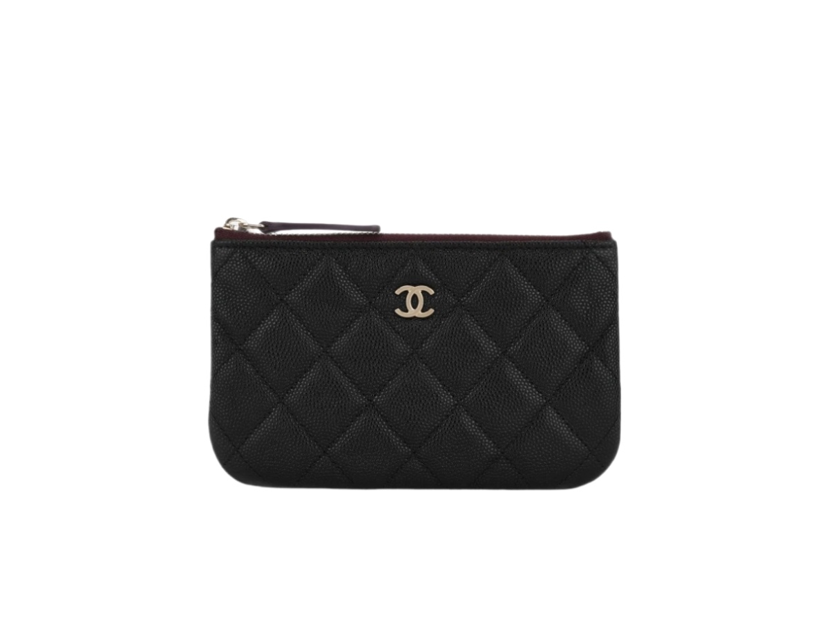 https://d2cva83hdk3bwc.cloudfront.net/a82365-b01481-c3906-chanel-classic-mini-pouch-gold-black-1.jpg