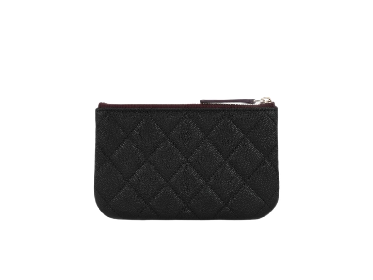 https://d2cva83hdk3bwc.cloudfront.net/a82365-b01481-c3906-chanel-classic-mini-pouch-gold-black-2.jpg
