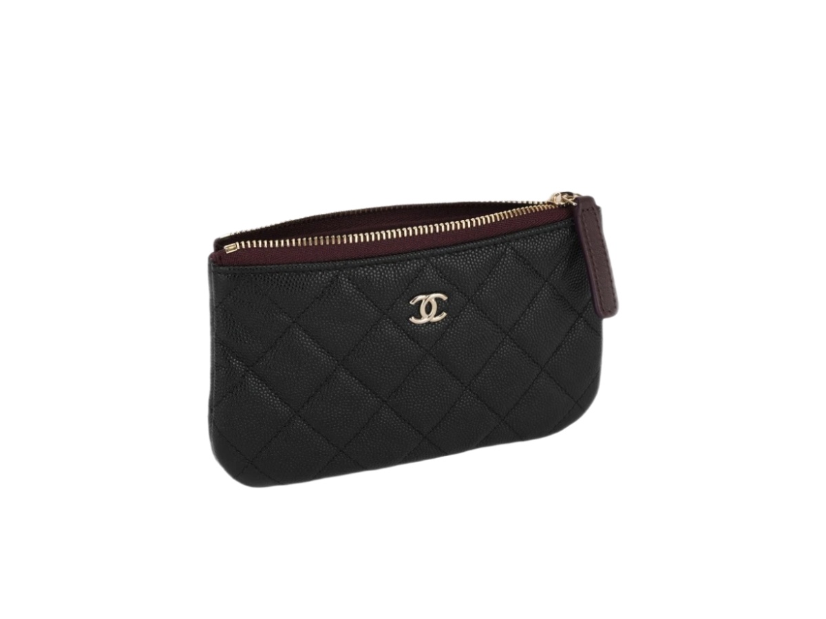 https://d2cva83hdk3bwc.cloudfront.net/a82365-b01481-c3906-chanel-classic-mini-pouch-gold-black-3.jpg