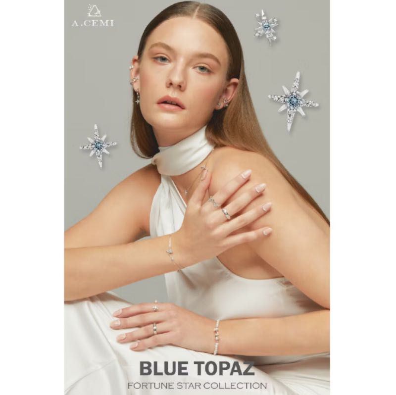 https://d2cva83hdk3bwc.cloudfront.net/acemi-jewelry_a-cemi-blue-topaz-8-fortune-star-hoop-6.jpg