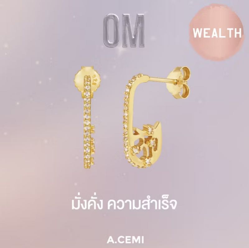 https://d2cva83hdk3bwc.cloudfront.net/acemi-jewelry_a-cemi-om-universe-galaxy-earring--gold--2.jpg