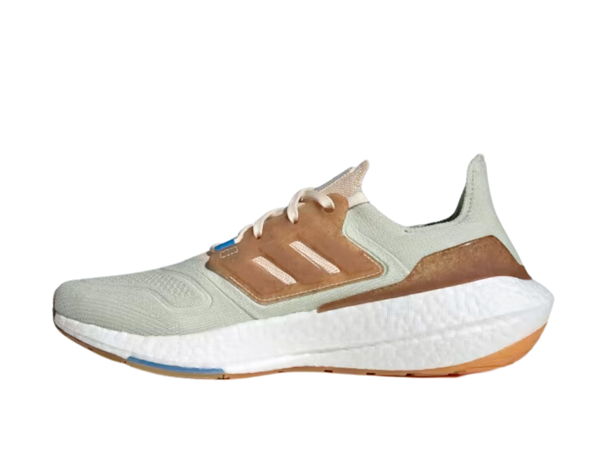 https://d2cva83hdk3bwc.cloudfront.net/adidas-ultraboost-22-made-with-nature-linen-green-ecru-tint-and-pulse-blue-2.jpg