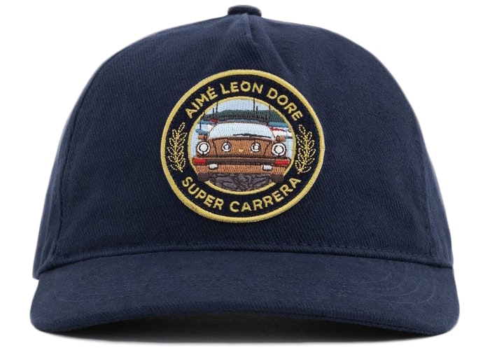 https://d2cva83hdk3bwc.cloudfront.net/aime-leon-dore-x-porsche-911sc-grille-badge-hat-navy-1.jpg