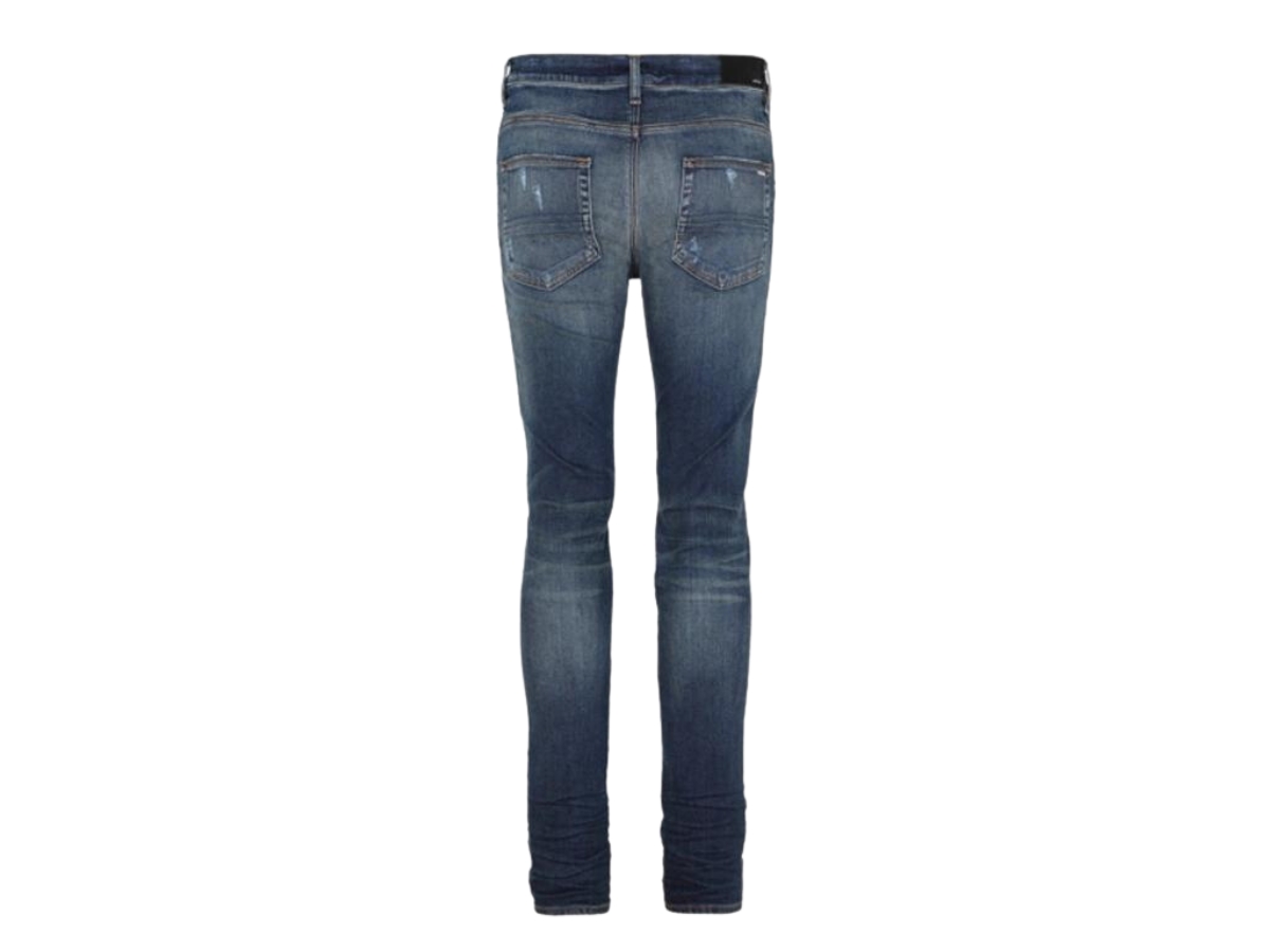 https://d2cva83hdk3bwc.cloudfront.net/amiri-faded-distressed-skinny-jeans-deep-classic-indigo-2.jpg