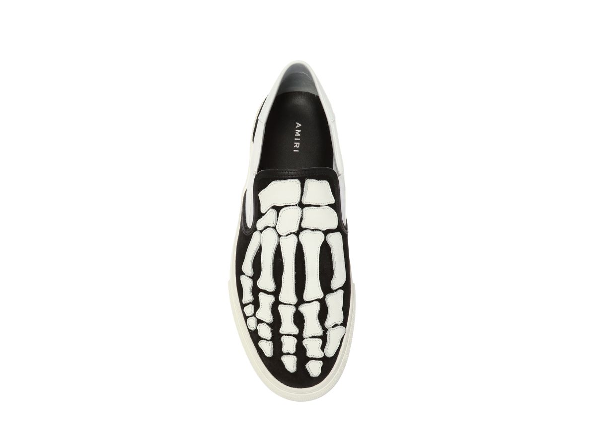 https://d2cva83hdk3bwc.cloudfront.net/amiri-skel-top-slip-on-white-and-black--4.jpg