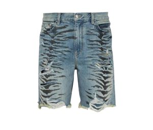 AMIRI Thrasher Distressed Tiger-Print Denim Shorts Blue