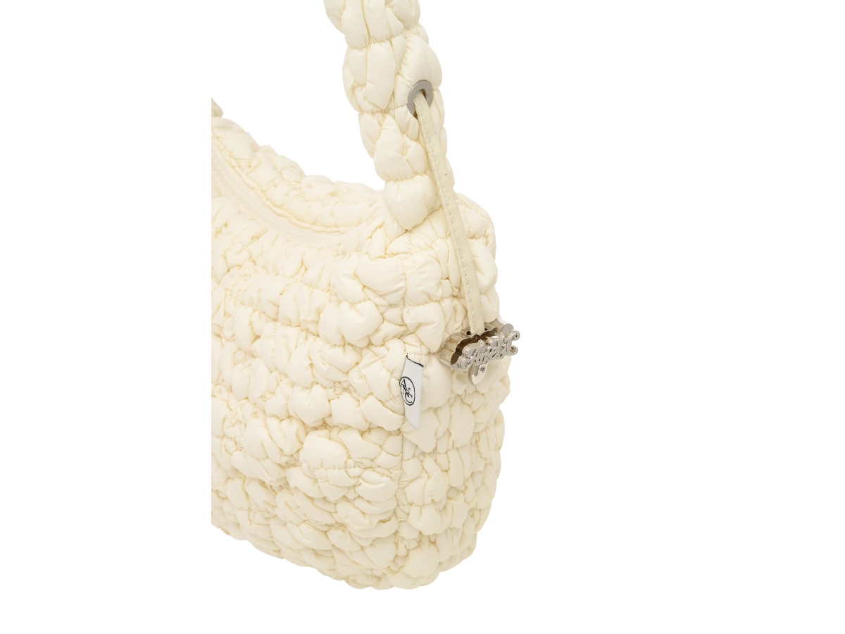 https://d2cva83hdk3bwc.cloudfront.net/anoetic-half-moon-cloud-bag-ivory-6.jpg