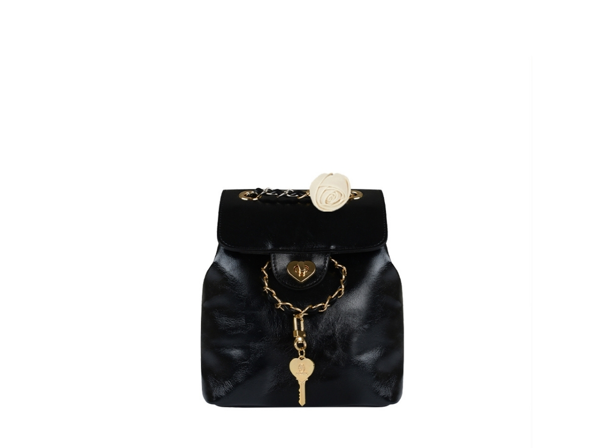 https://d2cva83hdk3bwc.cloudfront.net/anoetic-heart-corsage-backpack-black-1.jpg