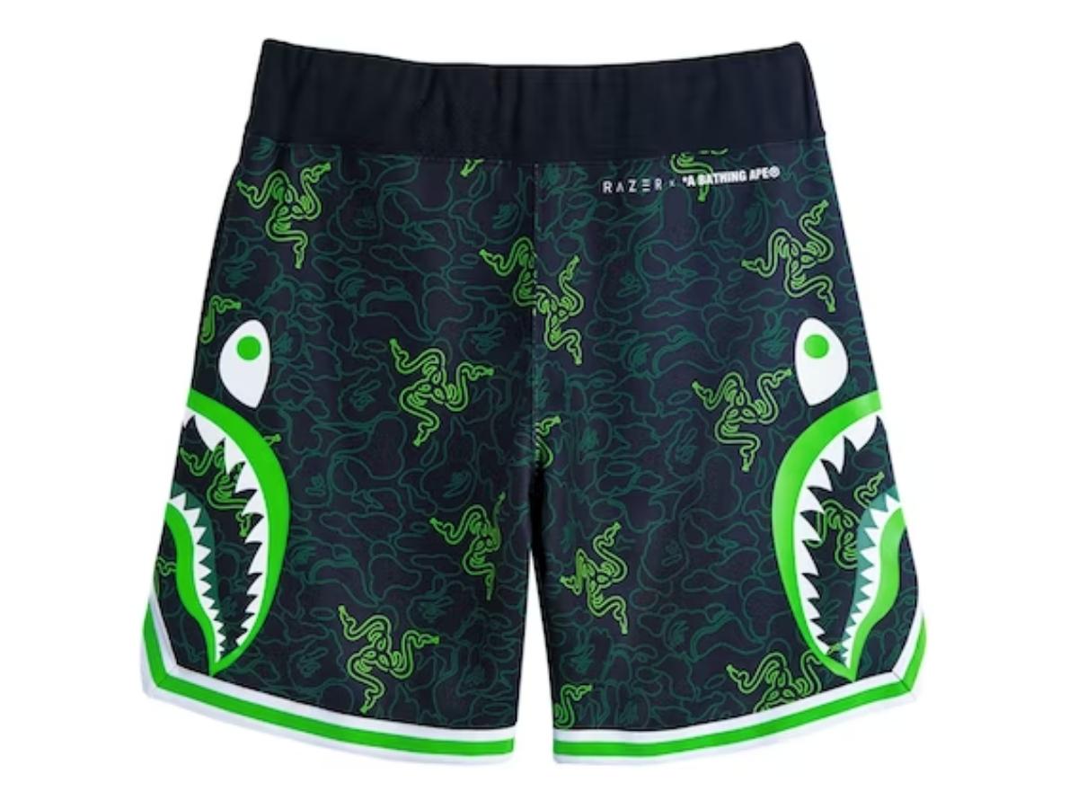 https://d2cva83hdk3bwc.cloudfront.net/ba-srabxrncbssbg3zqp-bape-x-razer-neon-camo-basketball-sweat-shorts-black-green-2.jpg