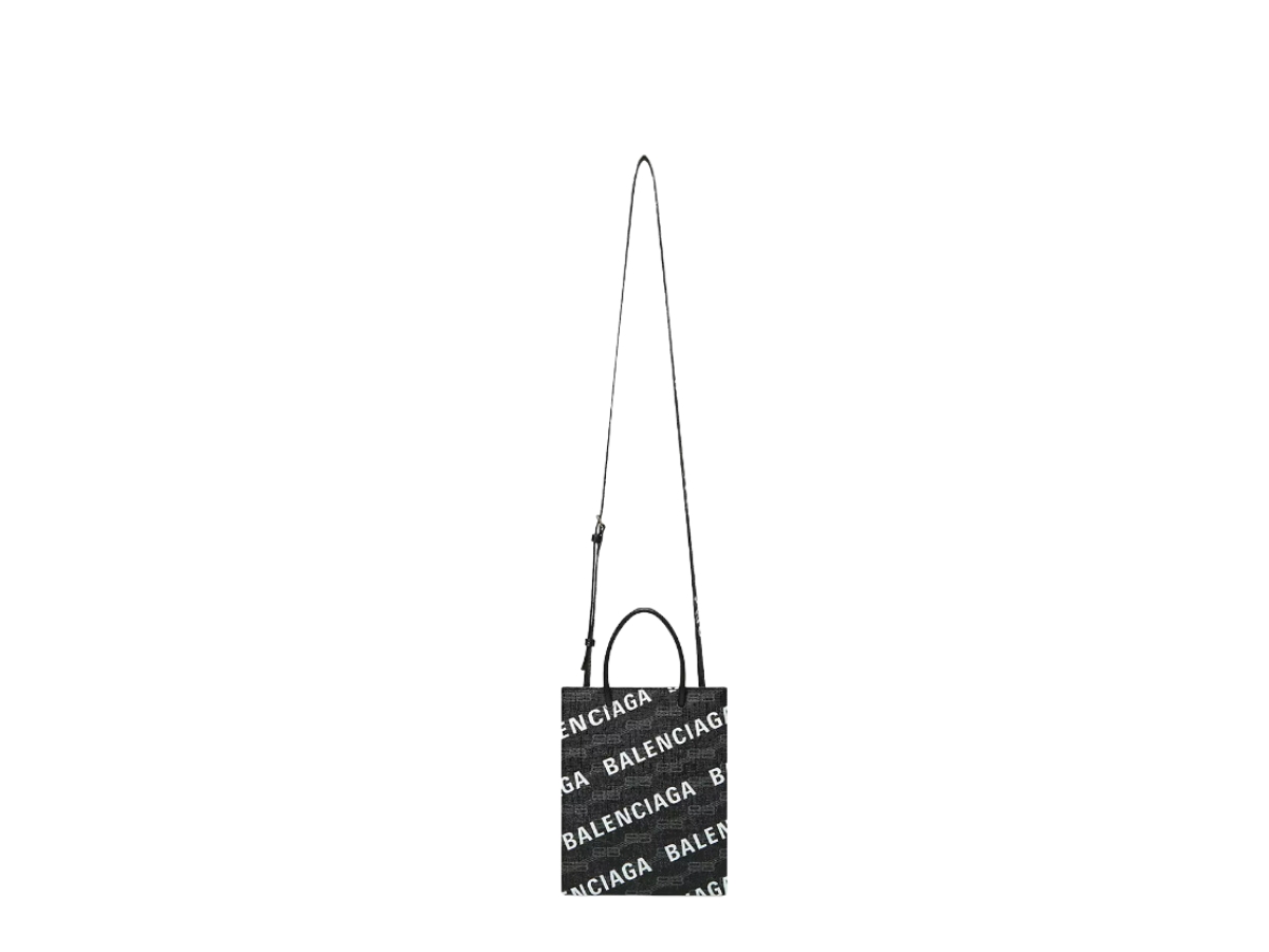 https://d2cva83hdk3bwc.cloudfront.net/balenciaga-large-shopping-bag-in-black-and-grey-bb-monogrambcoated-canvas-with-white-printed-all-over-logo-6.jpg