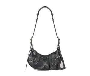 Balenciaga Le Cagole XS Shoulder Bag In Black Arena Lambskin With Aged-Silver Hardware