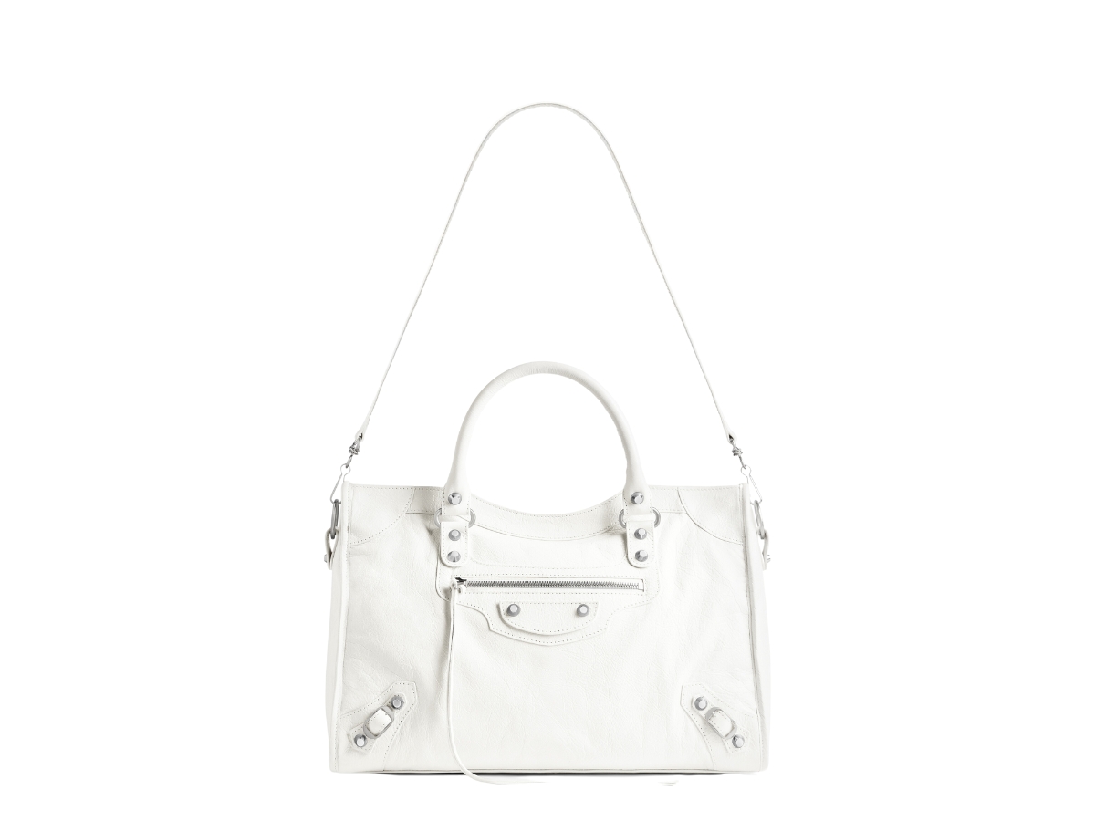https://d2cva83hdk3bwc.cloudfront.net/balenciaga-le-city-medium-bag-in-white-arena-lambskin-with-shiny-silver-hardware-5.jpg