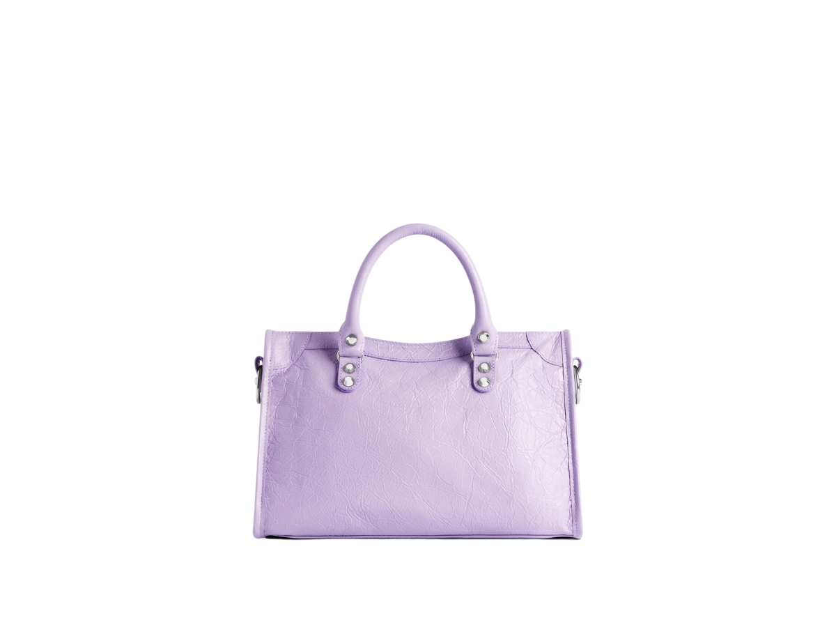 https://d2cva83hdk3bwc.cloudfront.net/balenciaga-le-city-small-bag-in-light-purple-arena-lamsbkin-with-shiny-silver-hardware-4.jpg
