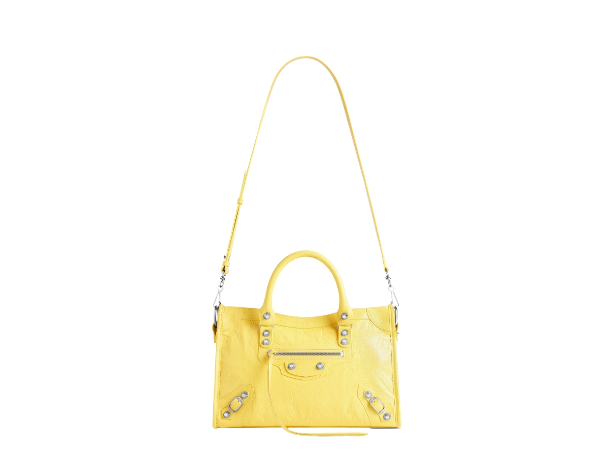 https://d2cva83hdk3bwc.cloudfront.net/balenciaga-le-city-small-bag-in-yellow-arena-lamsbkin-with-shiny-silver-hardware-5.jpg