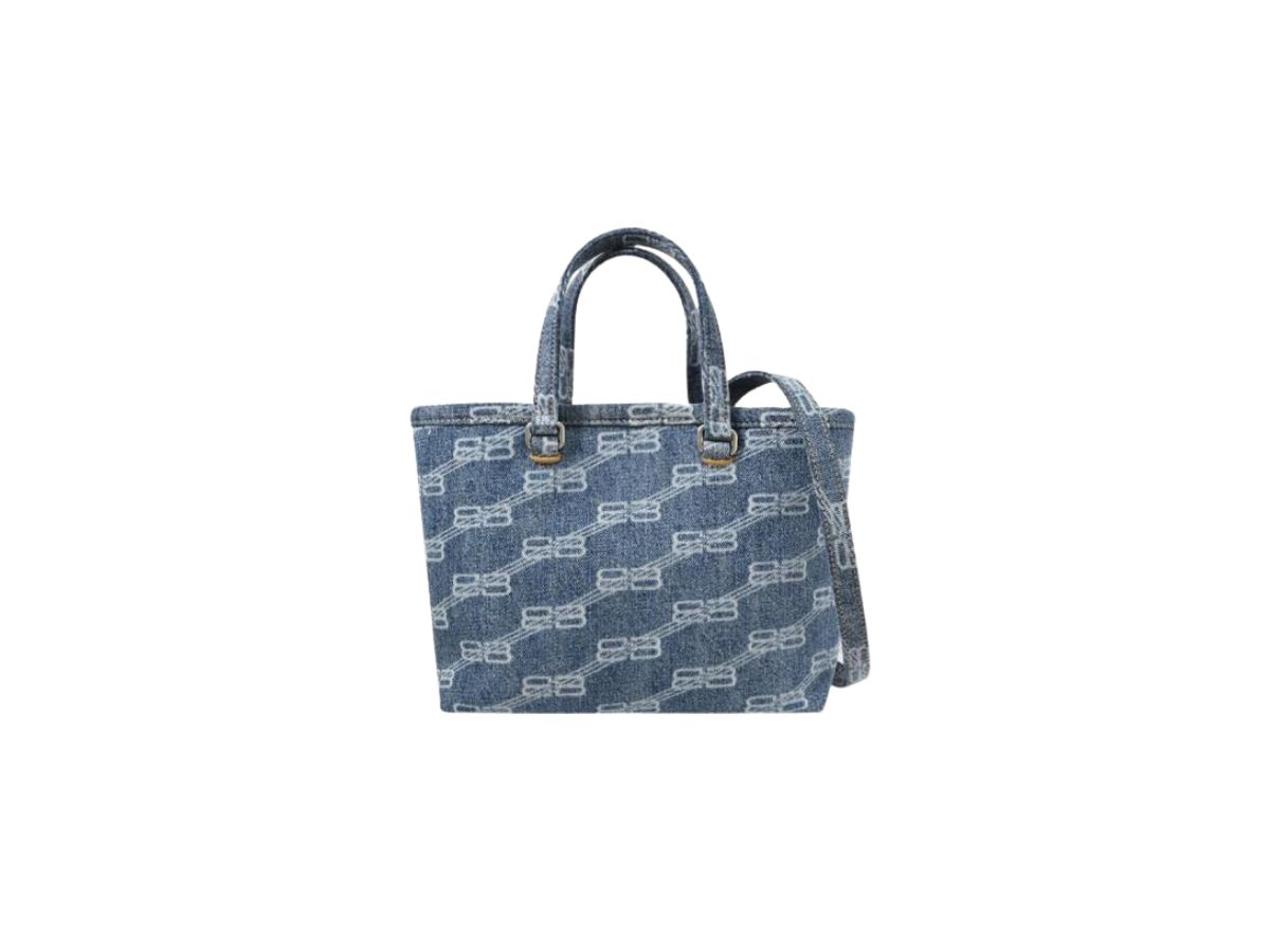 https://d2cva83hdk3bwc.cloudfront.net/balenciaga-signature-small-shopper-bag-in-bb-monogram-denim-with-silver-hardware-blue-1.jpg