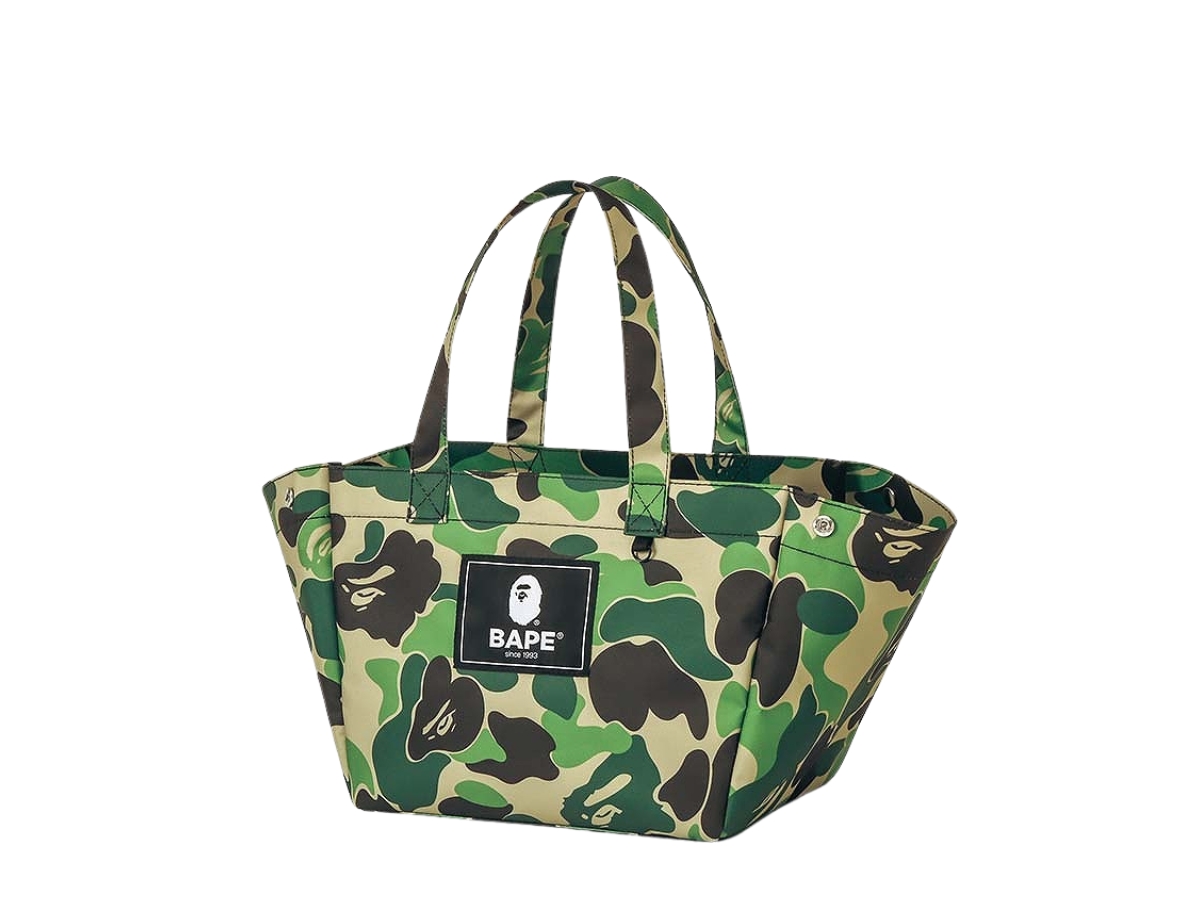 https://d2cva83hdk3bwc.cloudfront.net/bape-kids-tote-bag-camo-collection-ss21-2.jpg