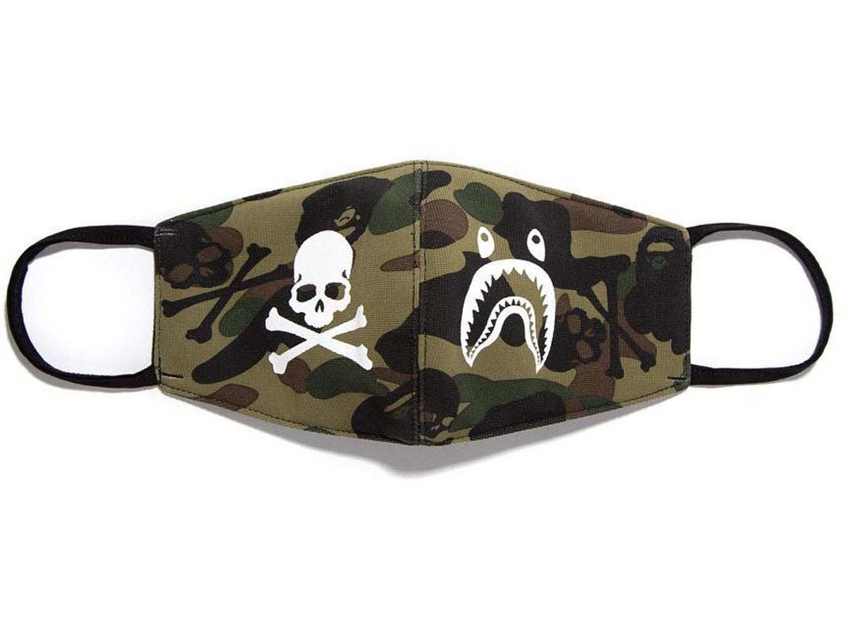 https://d2cva83hdk3bwc.cloudfront.net/bape-mastermind-japan-skull-and-shark-camo-face-mask-green-1.jpg