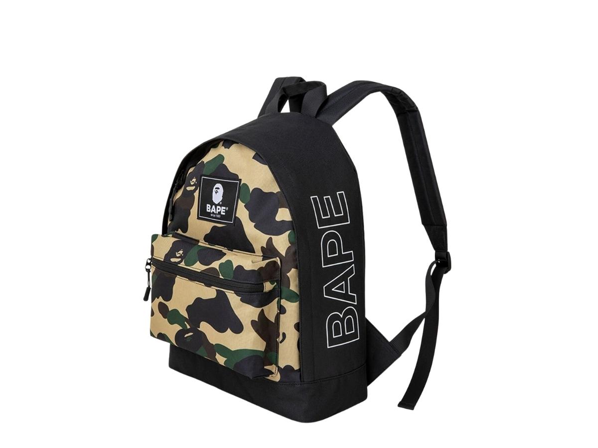 https://d2cva83hdk3bwc.cloudfront.net/bape-summer-collection-magazine-book-with-camo-backpack-3.jpg