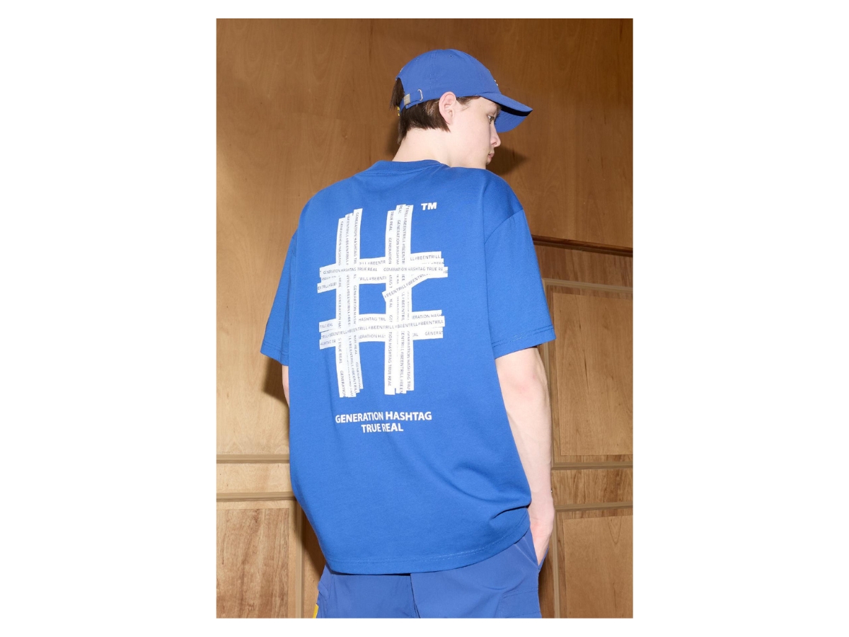 https://d2cva83hdk3bwc.cloudfront.net/beentrill-reflective-hashtag-overfit-short-sleeve-t-shirt-blue-3.jpg