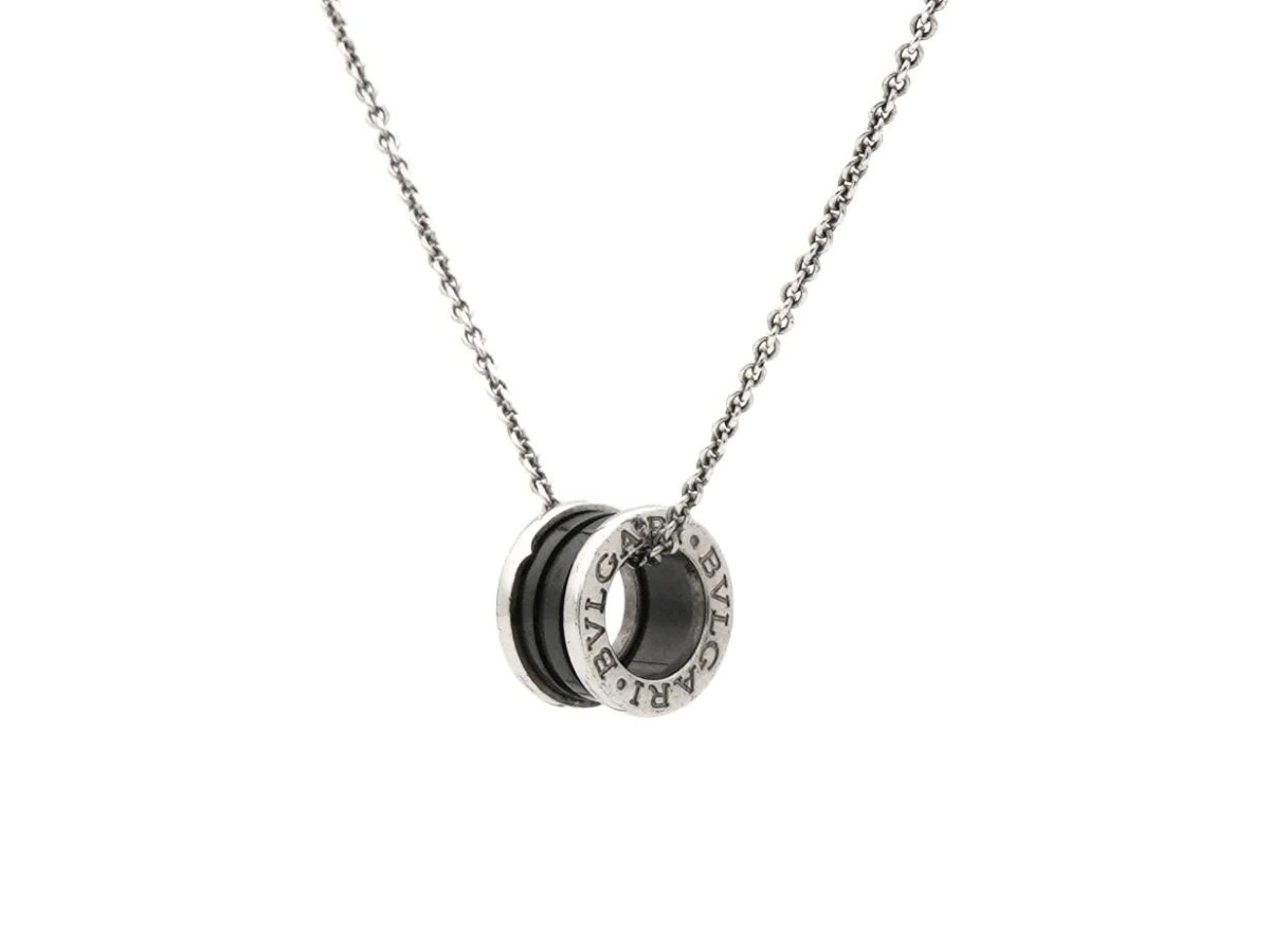 https://d2cva83hdk3bwc.cloudfront.net/bulgari-save-the-children-necklace-in-sterling-silver-with-black-ceramic-pendant-and-sterling-silver-chain-2.jpg