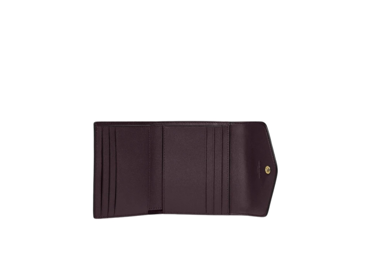 https://d2cva83hdk3bwc.cloudfront.net/c2328-coach-wyn-small-wallet-in-crossgrain-leather-black-with-gold-hardware-3.jpg