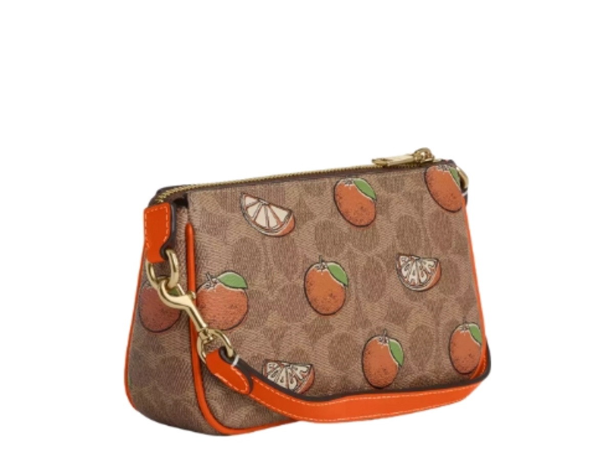 https://d2cva83hdk3bwc.cloudfront.net/cal27-coach-nolita-19-in-signature-canvas-with-orange-print-2.jpg