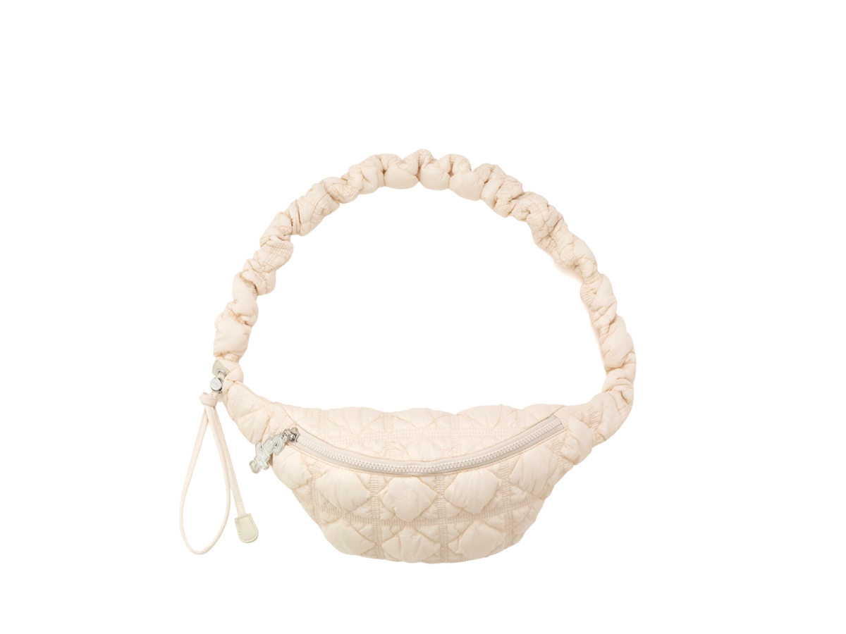 https://d2cva83hdk3bwc.cloudfront.net/carlyn-cozy-penny-in-nylon-with-silver-hardware-ivory-1.jpg