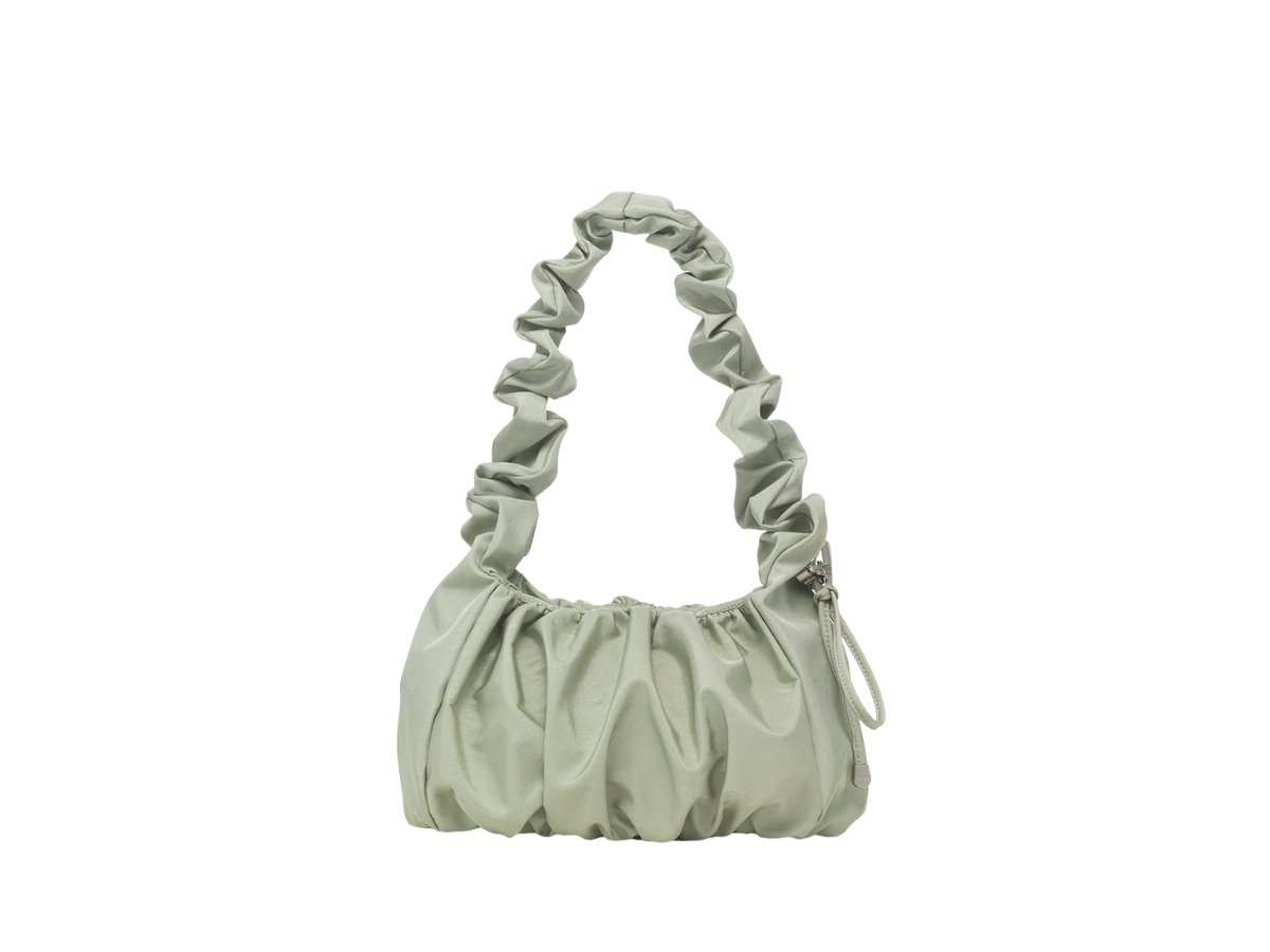https://d2cva83hdk3bwc.cloudfront.net/carlyn-meringue-mini-in-nylon-pistachio-1.jpg