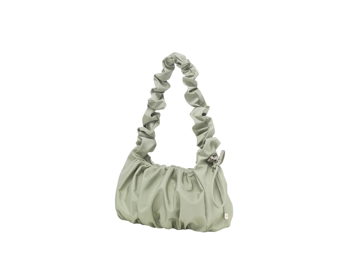https://d2cva83hdk3bwc.cloudfront.net/carlyn-meringue-mini-in-nylon-pistachio-2.jpg
