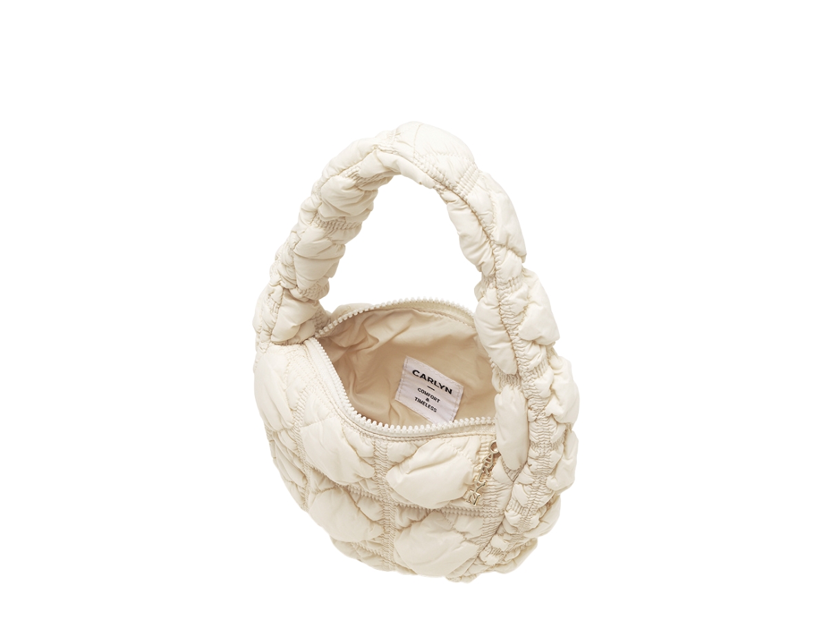 https://d2cva83hdk3bwc.cloudfront.net/carlyn-quilted-soft-mini-bag-ivory-2.jpg