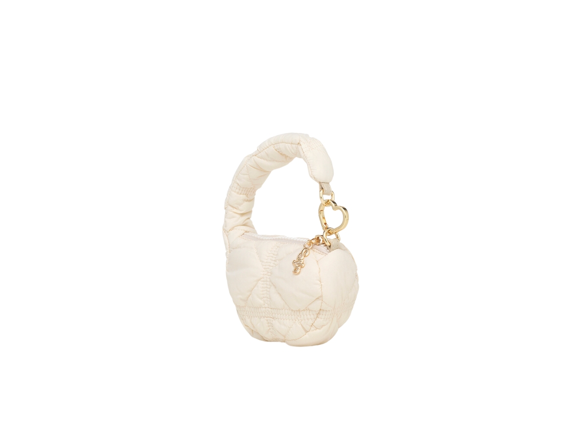 https://d2cva83hdk3bwc.cloudfront.net/carlyn-soft-teeny-bag-charm-ivory-2.jpg