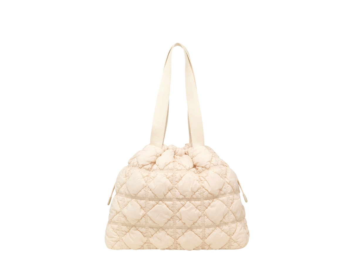 https://d2cva83hdk3bwc.cloudfront.net/carlyn-weekender-in-nylon-with-gold-hardware-ivory-3.jpg