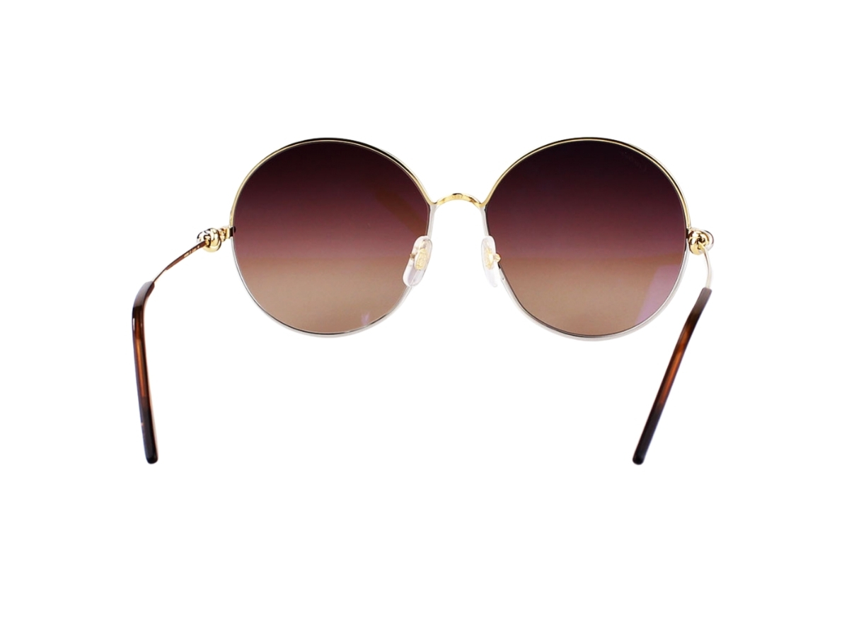 https://d2cva83hdk3bwc.cloudfront.net/cartier-ct0360s-002-61-sunglasses-in-gold-plate-frame-with-brown-gradient-lenses-4.jpg