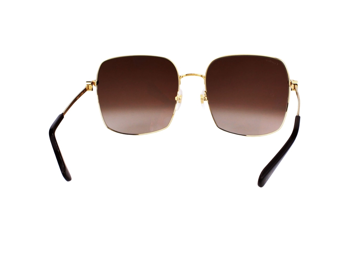https://d2cva83hdk3bwc.cloudfront.net/cartier-ct0401s-002-60-sunglasses-in-yellow-gold-titanium-frame-with-brown-gradient-lenses-4.jpg