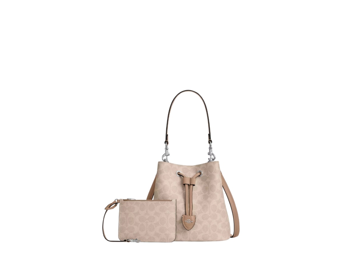 https://d2cva83hdk3bwc.cloudfront.net/cbh07-sand-coach-rowan-bucket-bag-in-signature-canvas-sand-taupe-2.jpg
