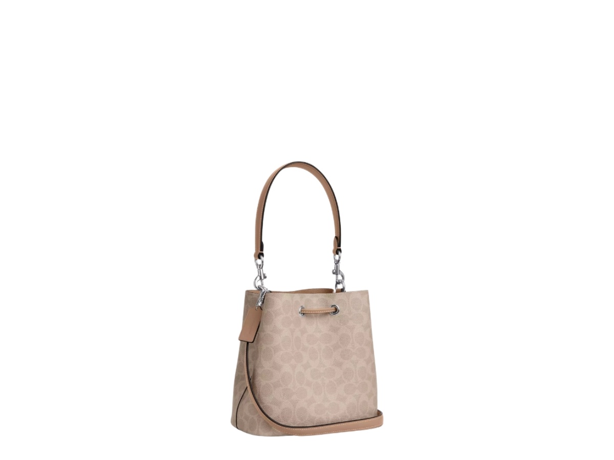 https://d2cva83hdk3bwc.cloudfront.net/cbh07-sand-coach-rowan-bucket-bag-in-signature-canvas-sand-taupe-3.jpg