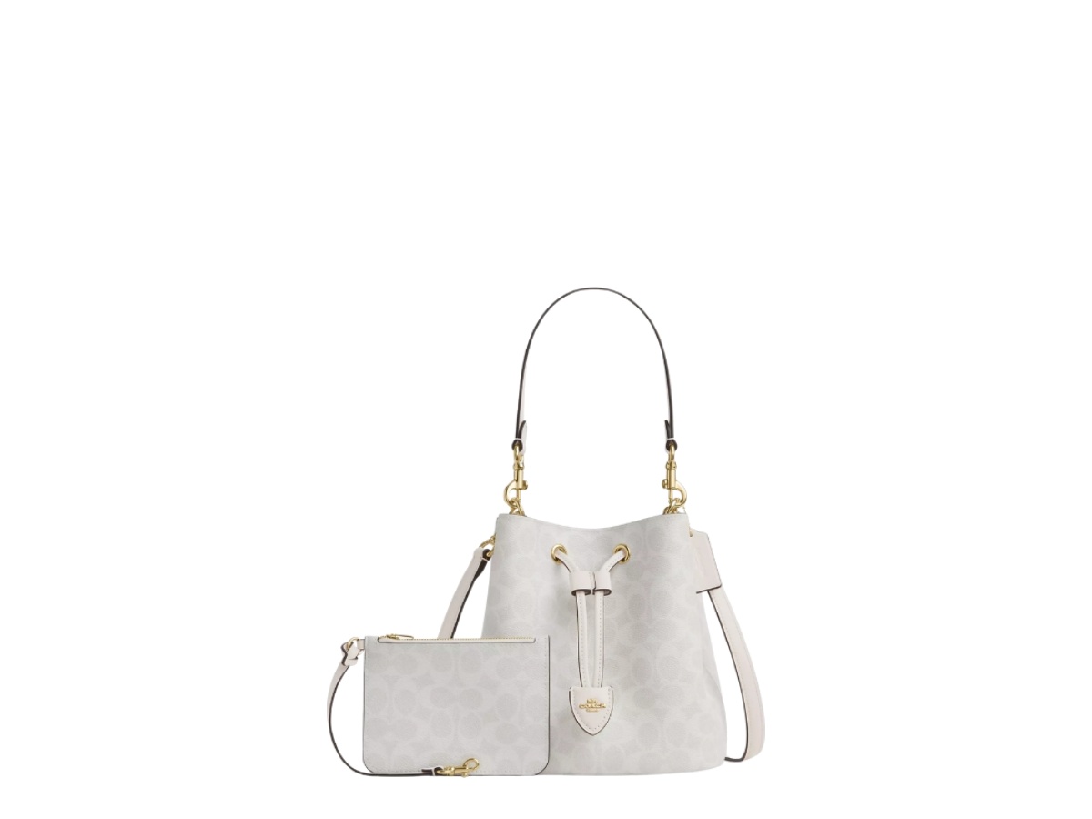 https://d2cva83hdk3bwc.cloudfront.net/cbh07-white-coach-rowan-bucket-bag-in-signature-canvas-chalk-white-2.jpg